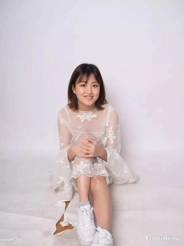 Xi Ya Xiong, 21